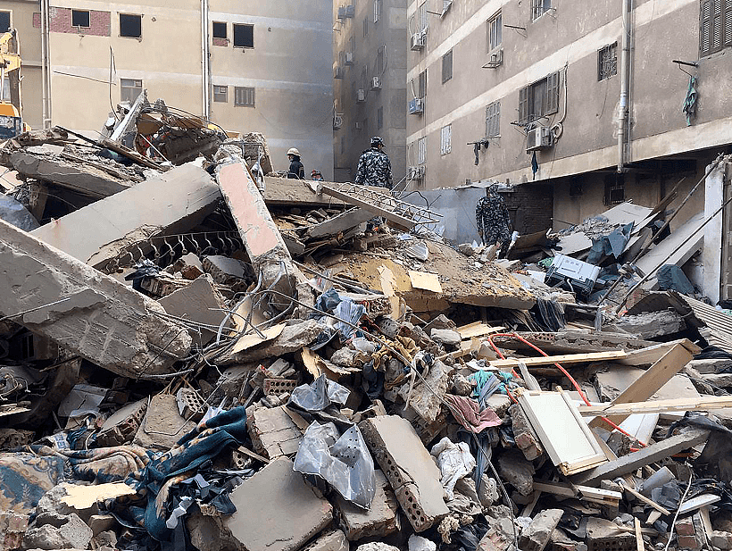 埃及首都居民楼倒塌16人死亡 十层建筑转眼成废墟（组图） - 4