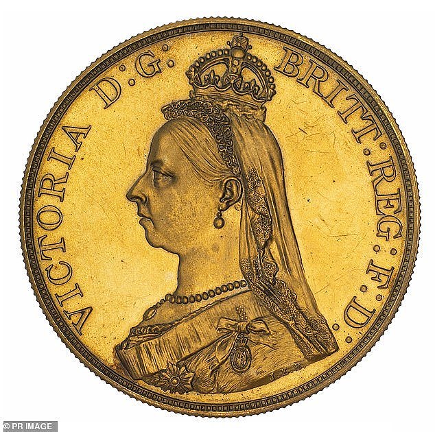 41206572-9425769-This_Five_Pound_Coin_from_1887_featuring_a_sour_looking_Queen_Vi-m-20_1617252186817.jpg,0