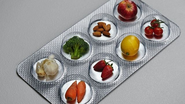 Concept image: foods in a pill blister