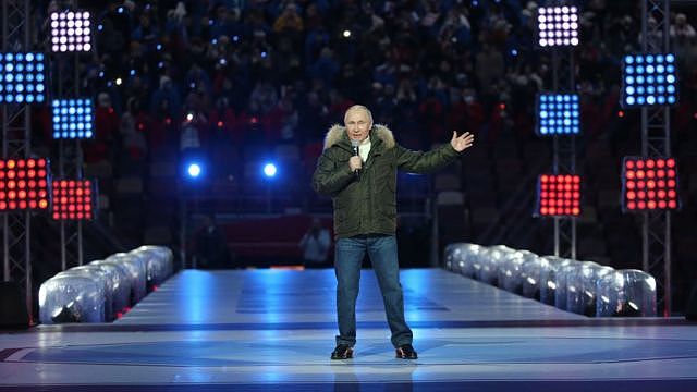 Vladimir Putin on a stage