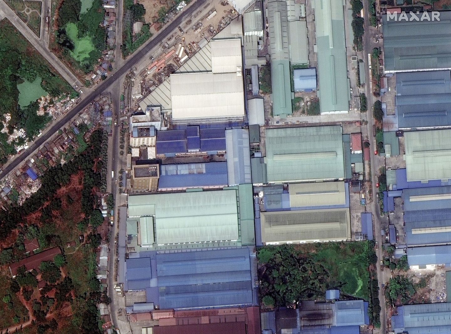 2021年3月9日，Maxar Technologies提供位于缅甸仰光的中国工厂卫星图像。（AP）