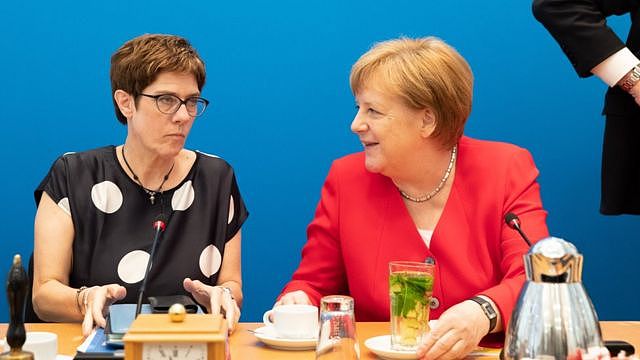 German Christian Democratic Union (CDU) party chairwoman Annegret Kramp- Karrenbauer (L) and German Chancellor Angela Merkel (R) talk during a board meeting at CDU headquarters in Berlin, Germany, 24 June 2019