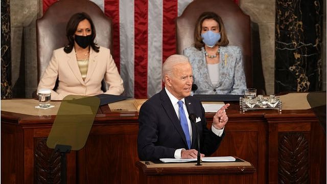 Biden flanked by Harris and Pelosi