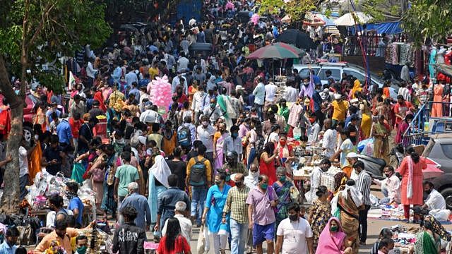Crowds of people are seen shopping during a weekly market at Kandivali (a suburb in North-West of Mumbai)