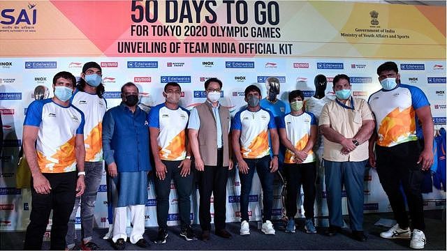 Union Sports Minister Kiren Rijiju along with Indian Olympic Association Boss Narinder Batra and Olympic players and officials during the launch of Team India kit for the Tokyo 2020 Olympics Games, on June 3, 2021 in New Delhi, India