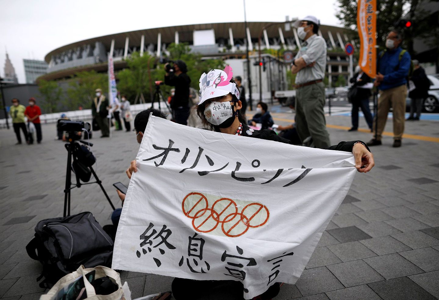 受新冠疫情影响，日本部分民众希望停办东京奥运会。（Reuters）