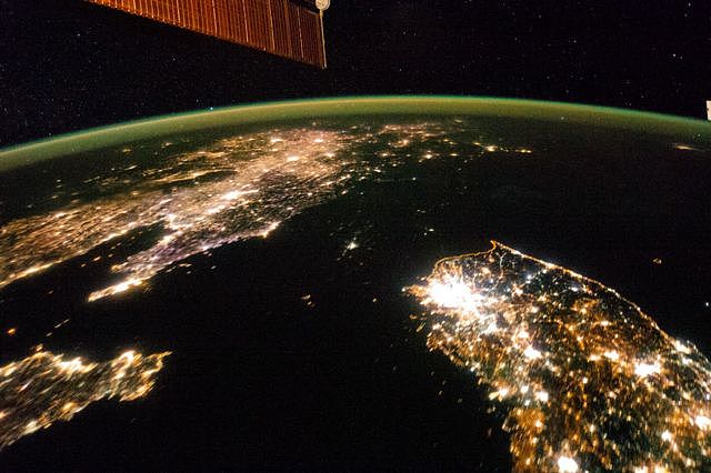 The Korean peninsula seen from the International Space Station in 2014 - Pyongyang is a speck of light in the darkness of North Korea