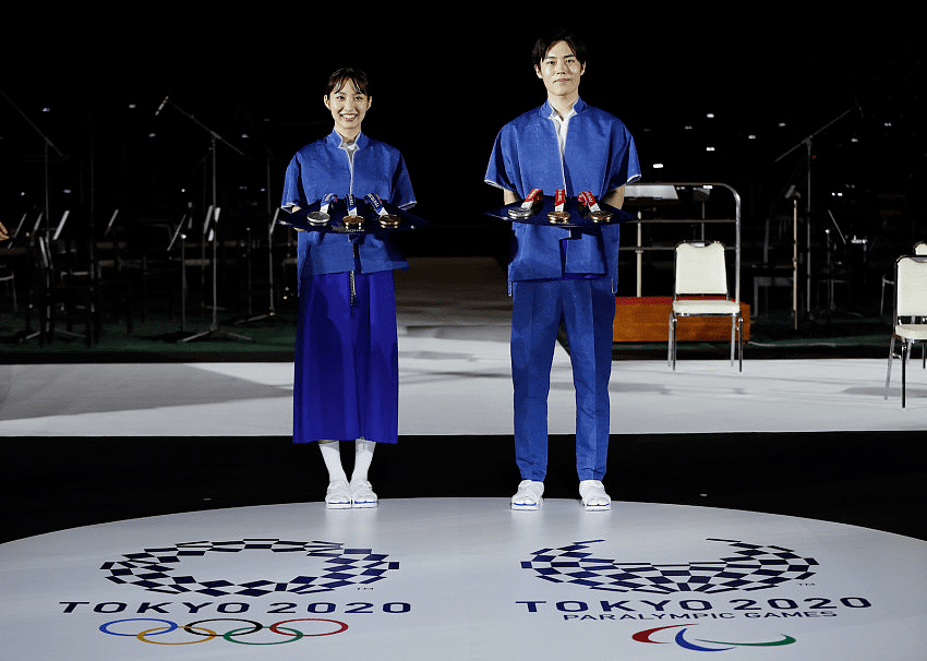 东京奥运会志愿者礼服公布 日本网友公开抵制（组图） - 1