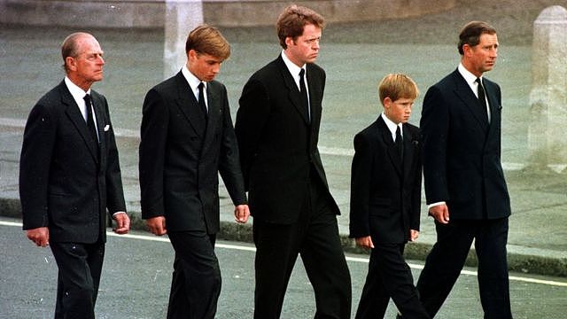 The Duke of Edinburgh, Prince William, Earl Spencer, Prince Harry and the Prince of Wales walking behind Diana, the Princess of Wales' funeral cortege