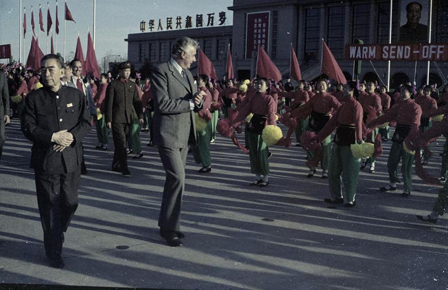 A 1973 photograph of Gough Whitlam and Premier Zhou Enlai surrounded by a parade of Chinese people holding flags