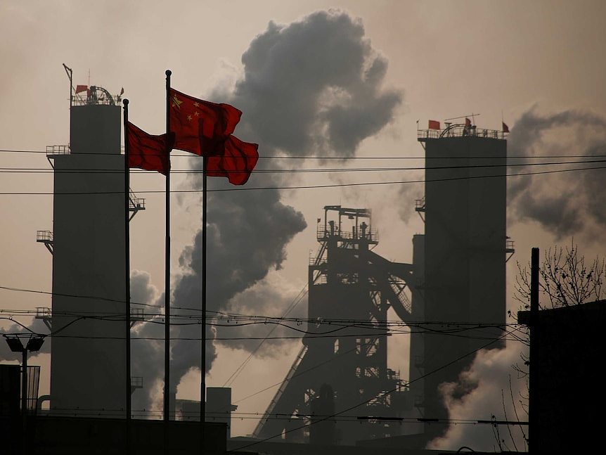 Chinese national flags are flying near a steel factory in Wu'an, Hebei province, China,