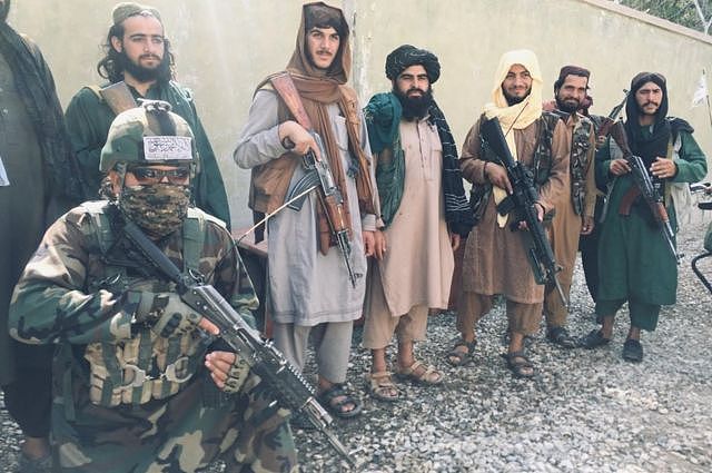 Taliban special forces (fighter kneeling bottom left) in Balkh district