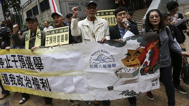 民阵成员游行往香港中联办（资料图片）