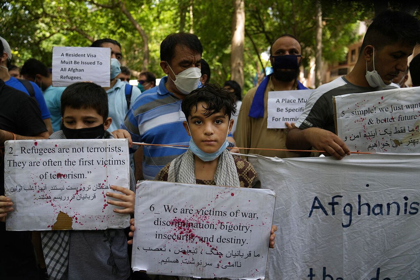 8月23日，印度德里大批阿富汗人集结在联合国难民公署办公室外示威，促请印度给予难民资格。（AP）