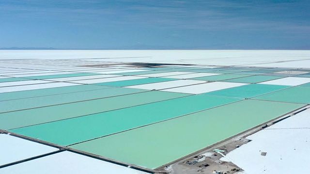 Aerial view of evaporation pools of the new state-owned lithium extraction complex, in the southern zone of the Uyuni Salt Flat, Bolivia