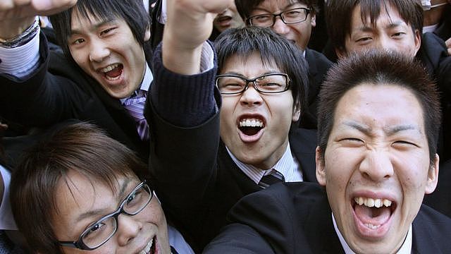 Japanese men celebrating