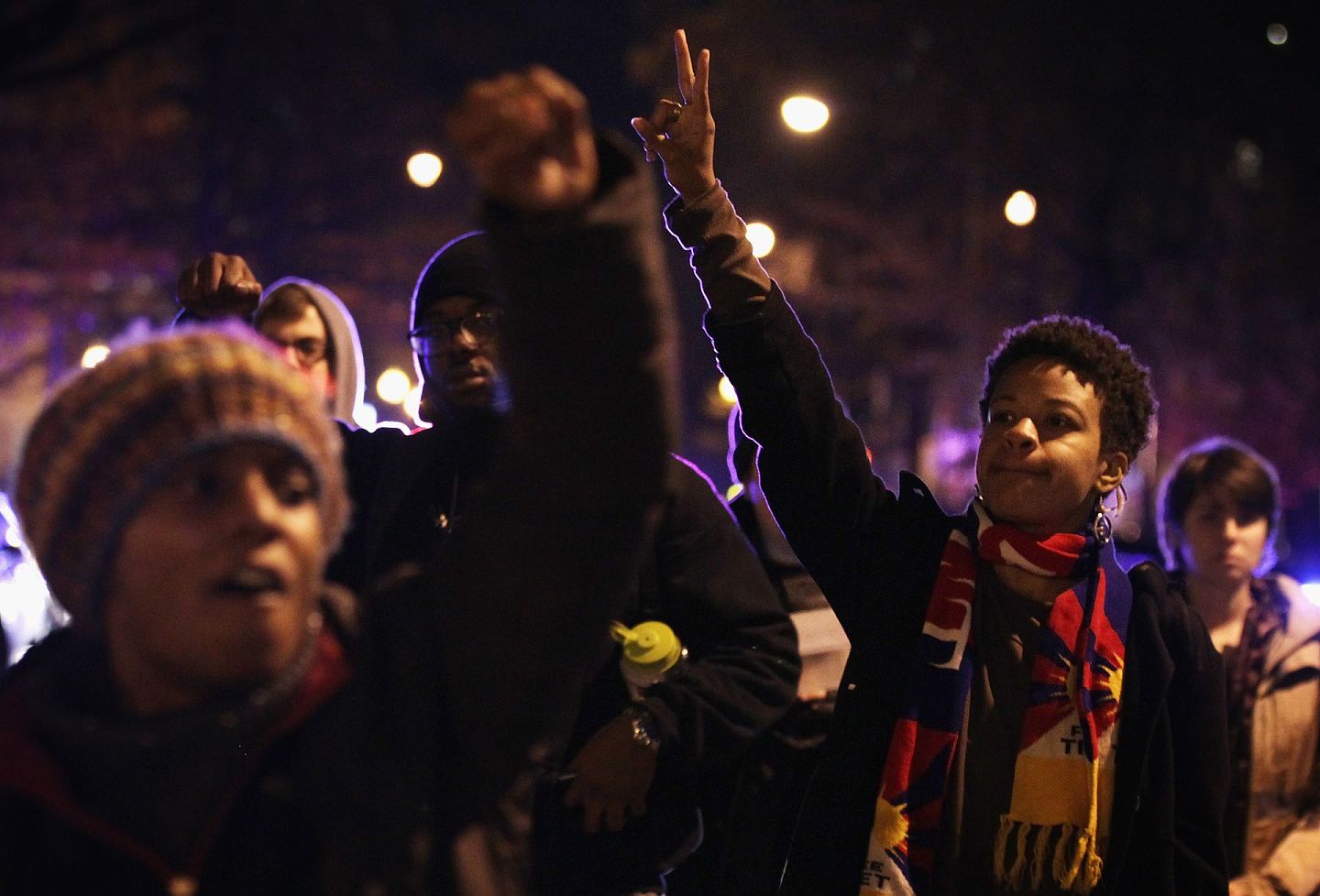 2014年12月，一群示威者在华盛顿因云集了大量游说企业的K街游行抗议。（Getty）