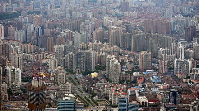 This photo taken on August 2, 2013 shows commercial and residential property from the under construction Shanghai Tower in Pudong, Shanghai.