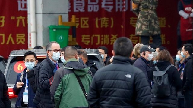 Peter Ben Embarek, a member of the WHO team tasked with investigating the origins of the coronavirus disease (COVID-19) pandemic, arrives with his team at Baishazhou market in Wuhan, China, January 31, 2021.