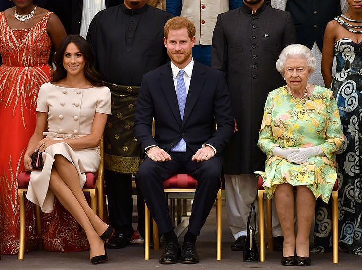 梅根（左起）、哈利与女王已经超过一年以上没这样同场出现。（路透数据照片）