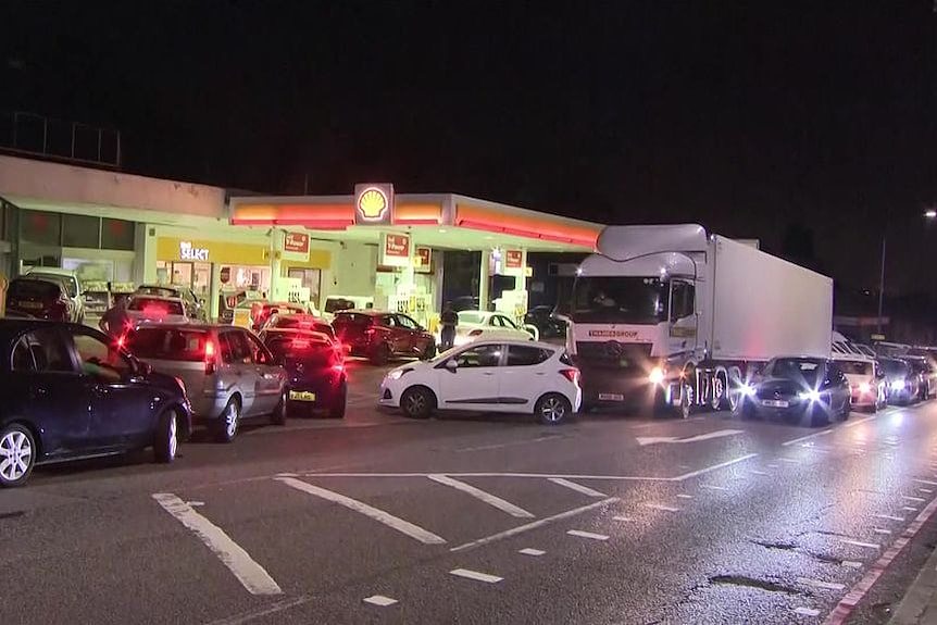 Long queues at petrol stations across UK amid fuel crisis