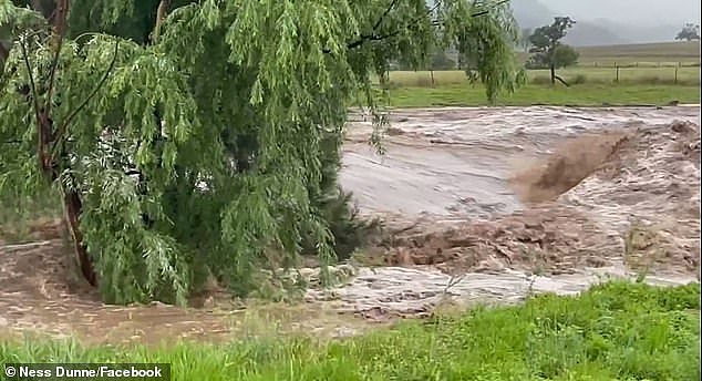 Raging floodwaters flowing in Gungal in the Upper Hunter Shire in NSW on Friday