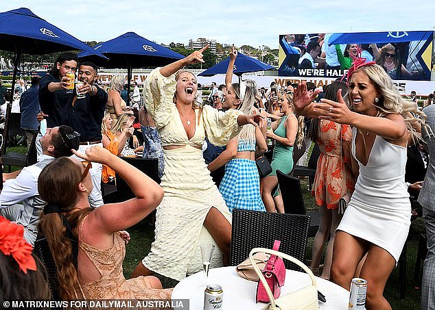 The much-maligned AstraZeneca vaccine could prove key to Australia dodging yet another Covid wave sweeping the nation if the UK's experience is any guide (pictured, racegoers enjoy the Melbourne Cup after Victoria's lockdown ended)
