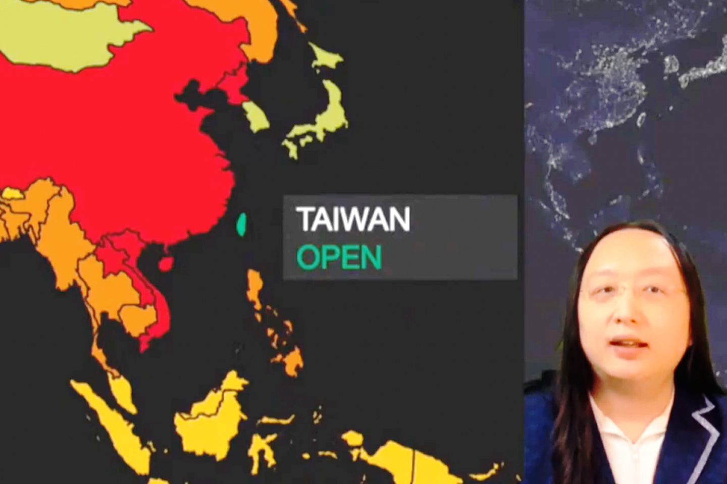 唐凤参加民主峰会，因为发言时影像地图中台湾与中国颜色不同而遭白宫官员下令停播画面。（取自民主峰会官方录影）