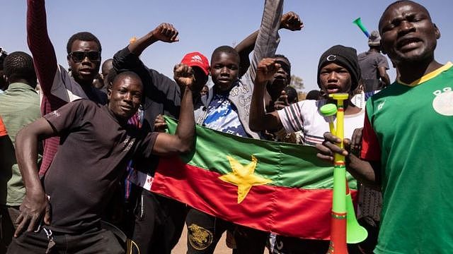 People show their support for the military after Burkina Faso President Roch Kabore was detained at a military camp in Ouagadougou, Burkina Faso, January 24, 2022