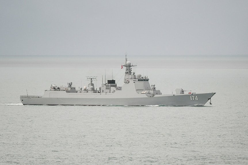 A chinese navy ship in the ocean.