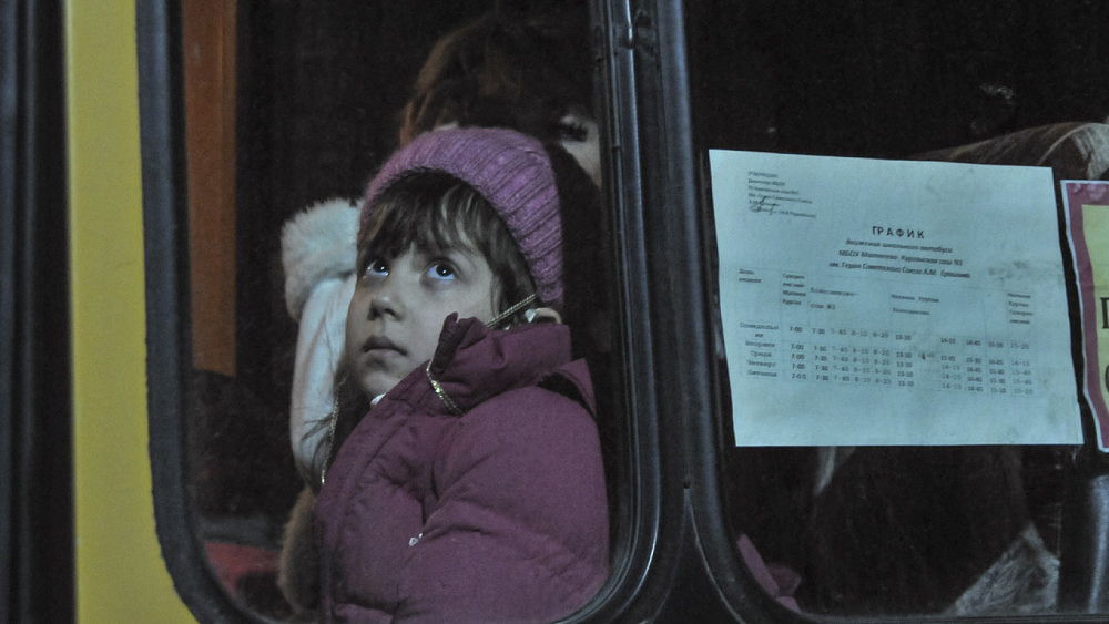 70万顿涅茨克居民逃往俄罗斯：过境便是不归路（组图） - 12