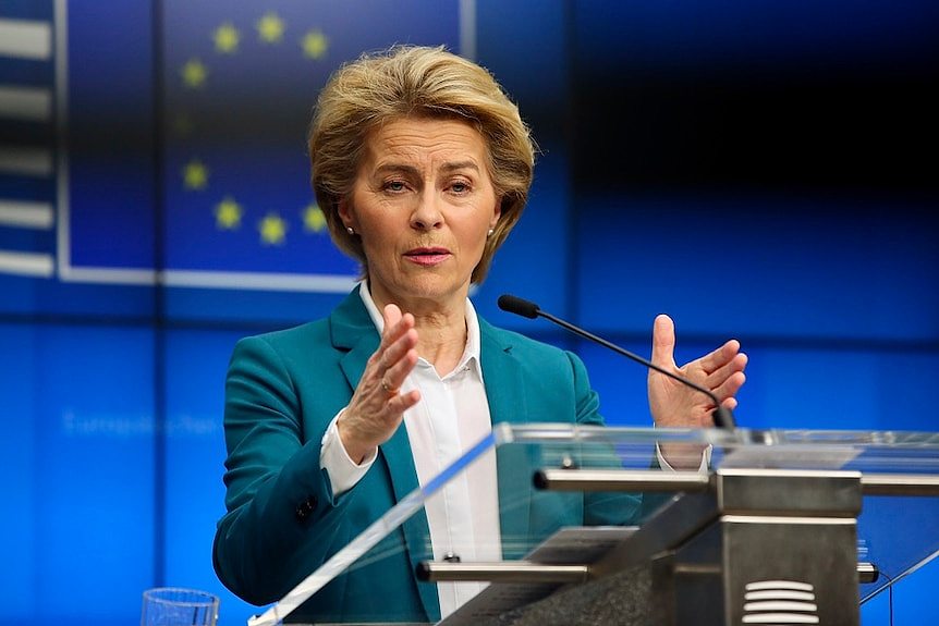 Ursula von der Leyen gesturing while giving a speech.