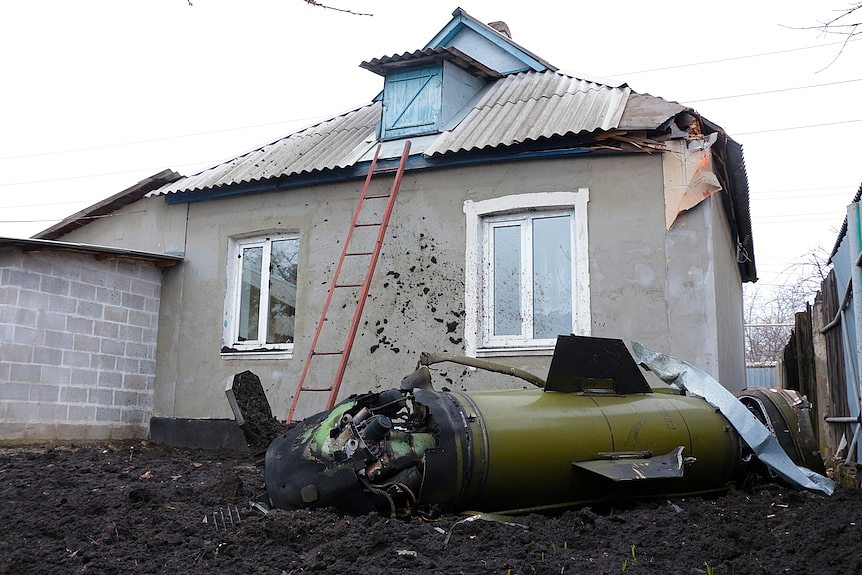 A missile in the front yard of a Donetsk home.