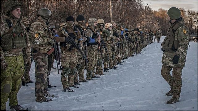 Members of the Ukraine Territorial Defence Forces attend the training session on using weapons in Kharkiv,