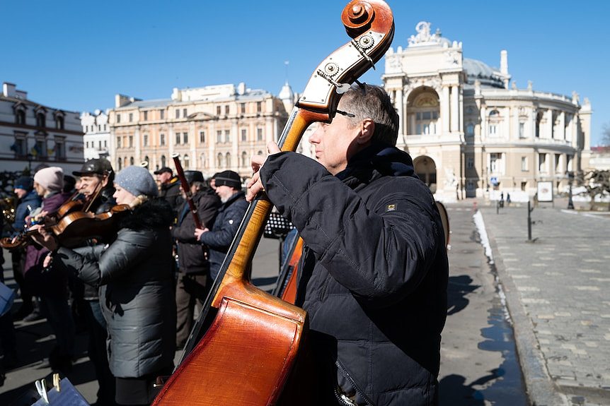 String musicians perform outside the Odessa Opera House. 