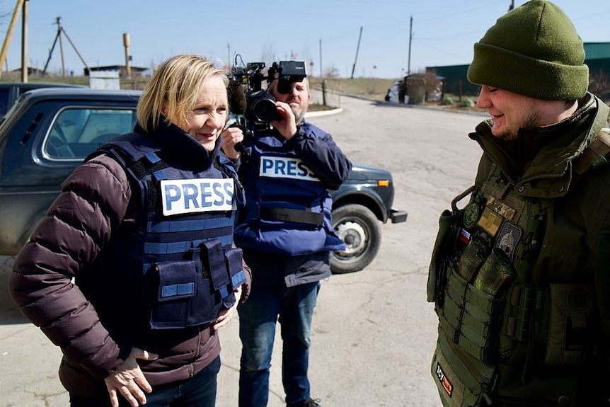 Sarah Ferguson speaking to Lieutenant Ivan near the Black Sea.