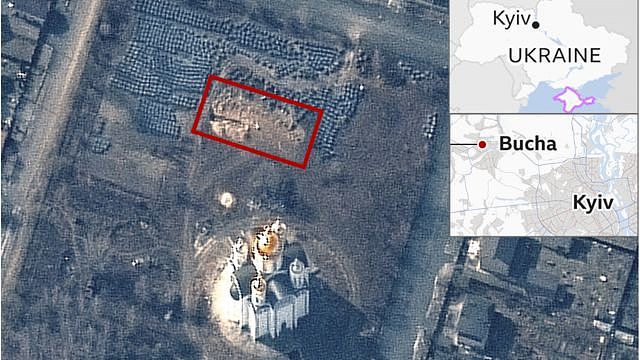 卫星图片显示布查一座教堂外的乱岗葬