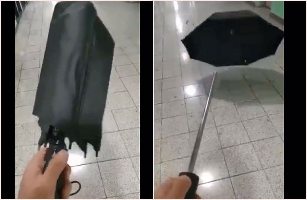 自动折伞开关一按，伞头竟喷射脱离，落地后还张伞。 （截自脸书《爆料公社》影片）
