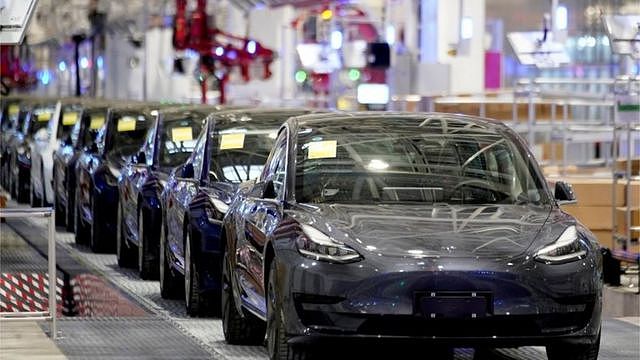 Tesla China-made Model 3 vehicles are seen during a delivery event at the carmaker