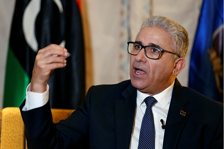 利比亚候任总理在爆发武装冲突后离开的黎波里（图） - 1