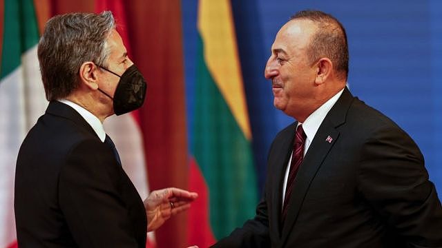 Antony Blinken, U.S. Secretary of State (L), left, welcomes Mevlut Cavusoglu, Foreign Minister of Turkey, at the beginning of an informal meeting of NATO members states foreign ministers on May 15, 2022 in Berlin, Germany.