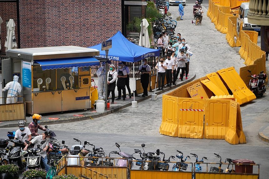 people line up on the streets