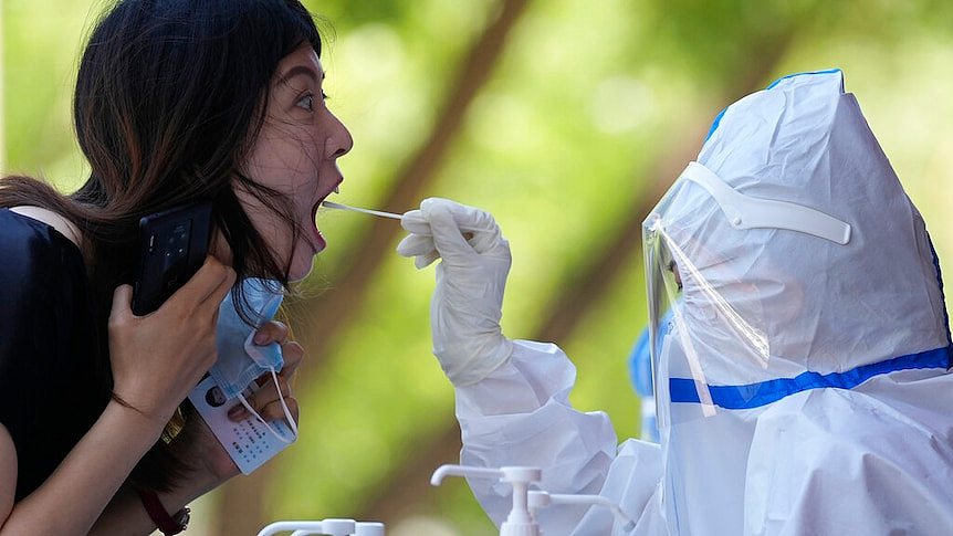 a woman gets PCR test