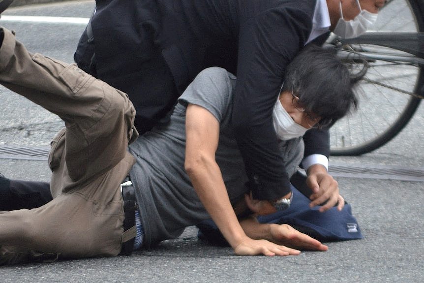 A man was caught at a shooting scene in Japan