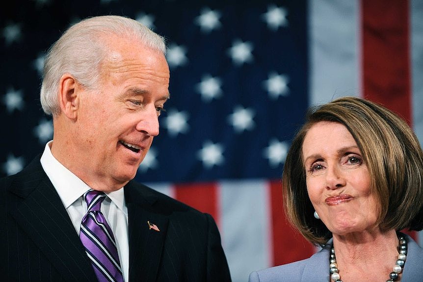 Joe Biden looking at Nancy Pelosi