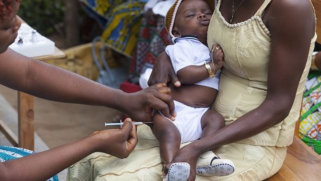 A child being vaccinated with hepatitis B in Togo.