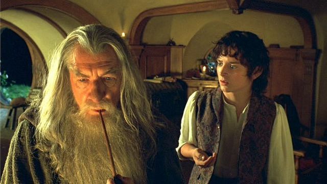 Scene from the first Lord of the Rings movie shows the characters Gandalf and Frodo