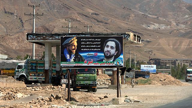 Banner showing Ahmad Massoud and his father with a slogan 
