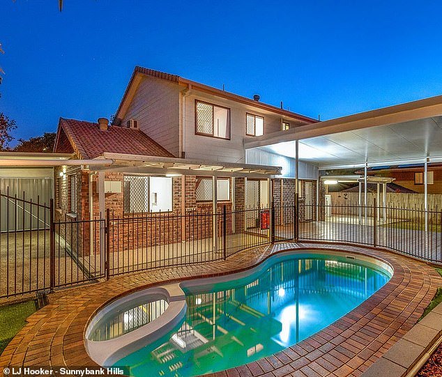 The in the affluent suburb property features a pristine swimming pool in the backyard