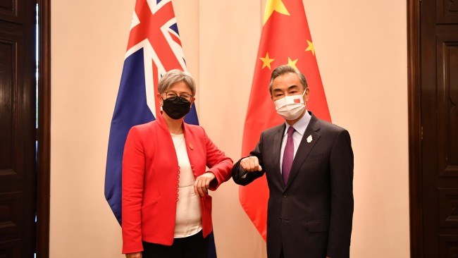 Chinese State Councilor and Foreign Minister Wang Yi with Australian counterpart Penny Wong. Picture: Xu Qin/Xinhua via Getty Images